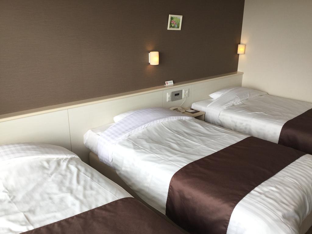 Hotel Gran View Garden Okinawa Tomigusuku Quarto foto